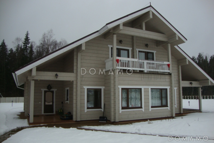 Проект дома из клееного бруса с несложными фасадами Проект дома из клееного бруса с несложными фасадами