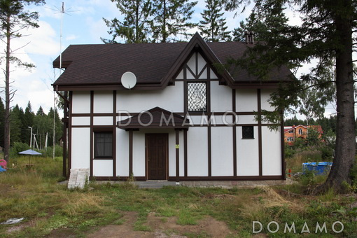 Проект каркасного дома в стиле фахверк с сауной на мансардном этаже