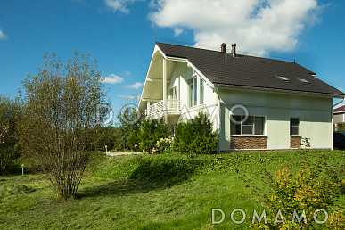 Проект дома из газобетона с угловой террасой