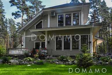 Проект дома из газобетона с местом для трех авто