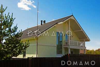 Проект кирпичного дома с угловой террасой