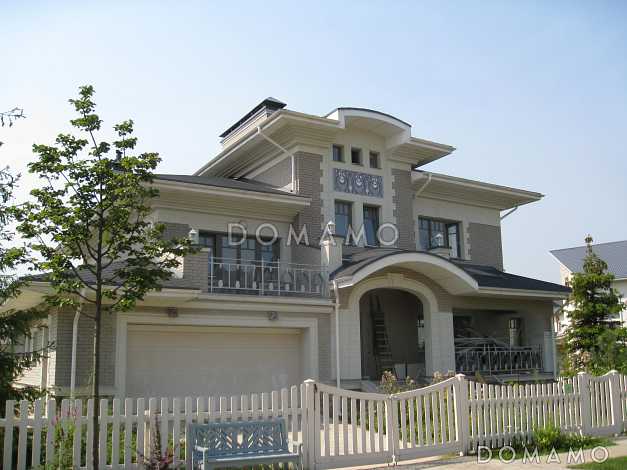 Проект коттеджа с гаражом