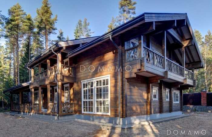 Проект дома из клееного бруса с мансардным этажом, огромной террасой и кабинетом на первом этаже Проект дома из клееного бруса с мансардным этажом, огромной террасой и кабинетом на первом этаже