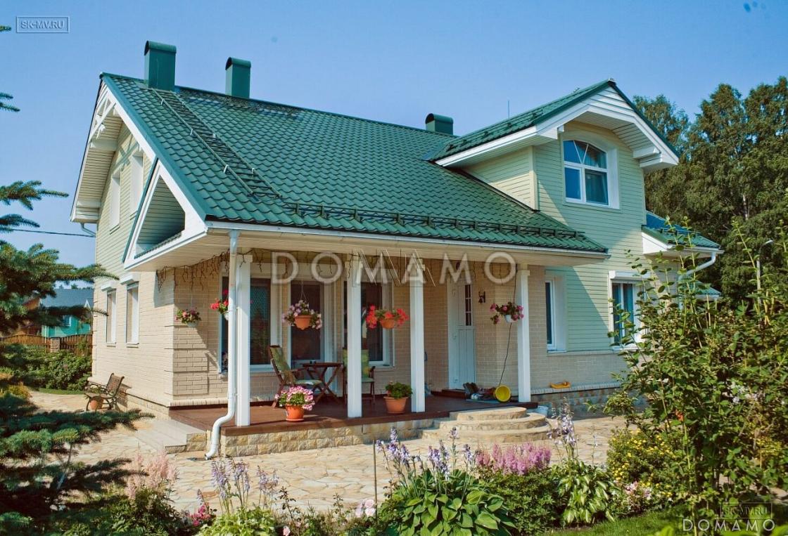 Проект каркасного дома с навесом для двух машин и крытой террасой / 4