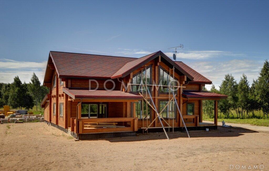 Проект деревянного дома из клееного бруса с большим эркером который является архитектурным украшением всего дома / 8