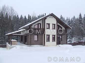 Проект дома из газобетона с цокольным этажом и небольшим бассейном