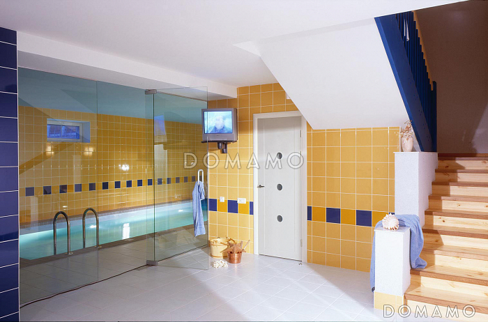 Проект дома из пеноблоков с гаражом и бассейном расположенные на цокольном этаже Проект дома из пеноблоков с гаражом и бассейном расположенные на цокольном этаже