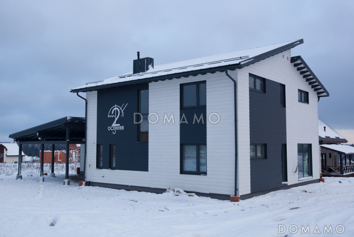 Проект каркасного дома с хозяйственной пристройкой и навесом на две машины