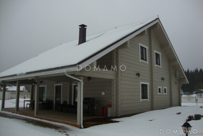 Проект дома из клееного бруса с несложными фасадами Проект дома из клееного бруса с несложными фасадами