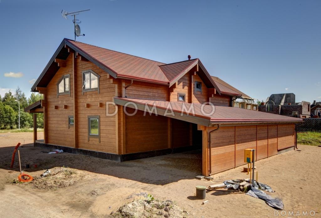 Проект деревянного дома из клееного бруса с большим эркером который является архитектурным украшением всего дома / 6