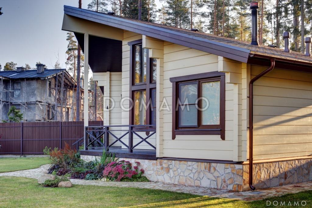 Проект одноэтажного необычного по форме дома из клееного бруса / 2