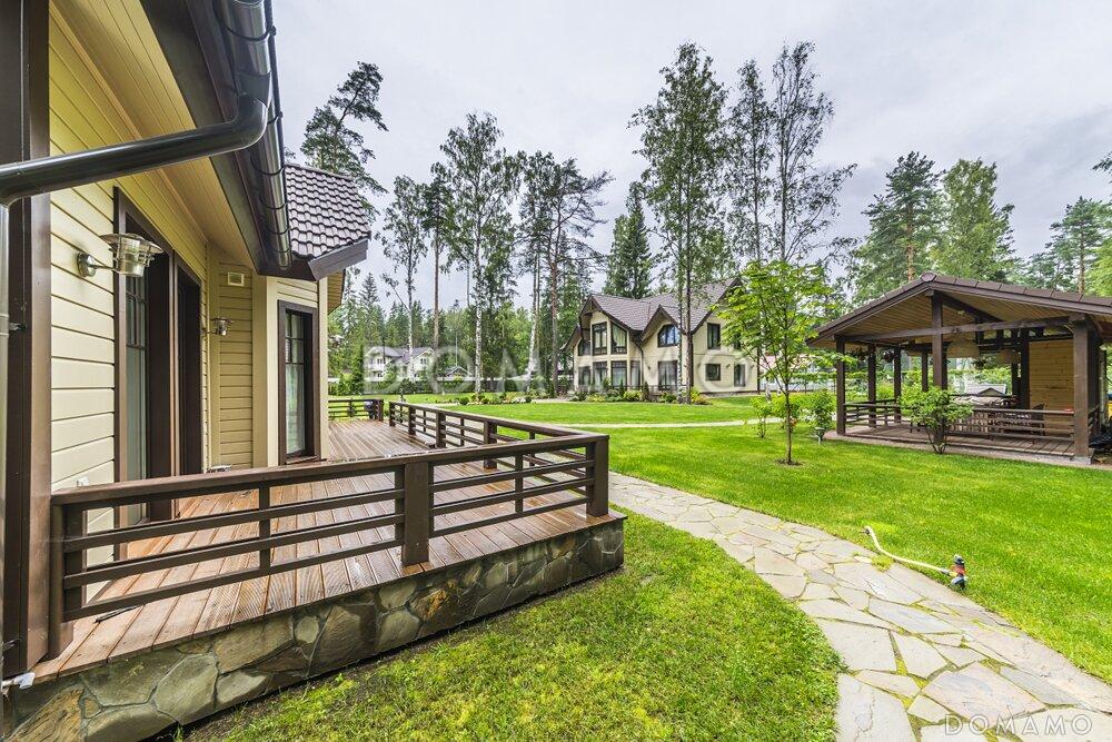 Проект коттеджа из газобетона с мансардой, эркером, светлой гостиной и открытой террасой / 3