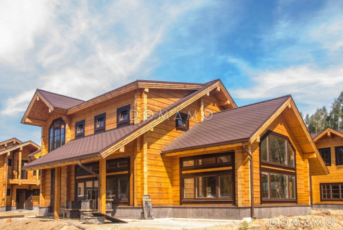 Проект двухэтажного дома из клееного бруса с изолированной кухней-столовой Проект двухэтажного дома из клееного бруса с изолированной кухней-столовой