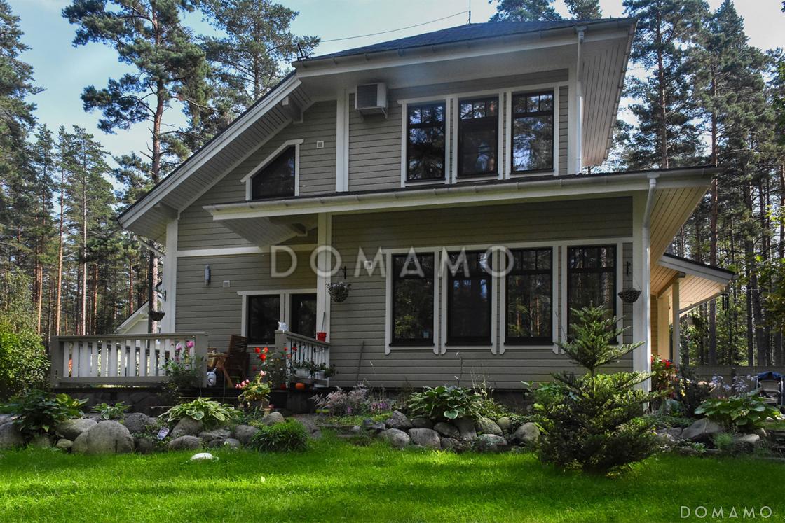 Проект дома из кирпича с местом для трех авто / 3