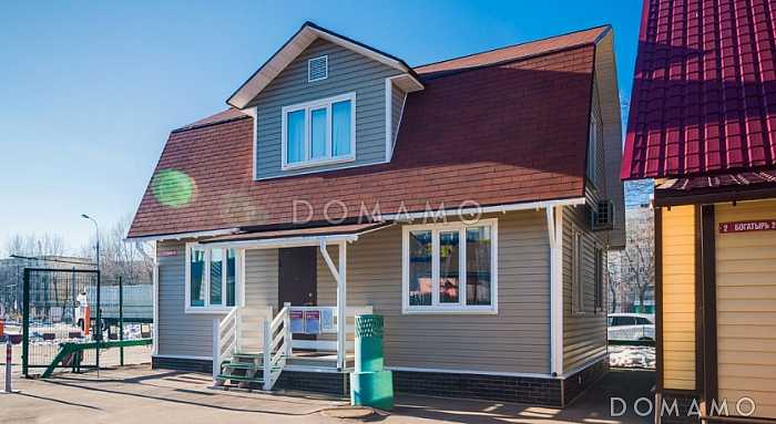 Проект дома из клееного бруса с облицовкой деревянной вагонкой