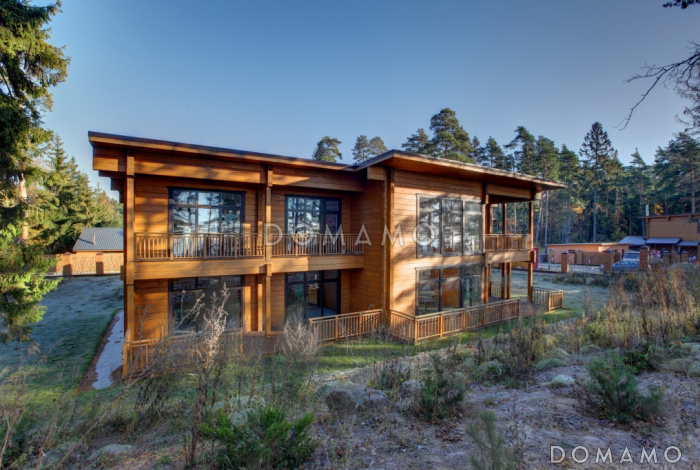 Проект двухэтажного дома из клееного бруса с кабинетом на первом этаже Проект двухэтажного дома из клееного бруса с кабинетом на первом этаже