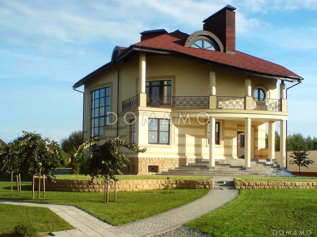 Проект современного дома с мансардным и цокольным этажом / 1