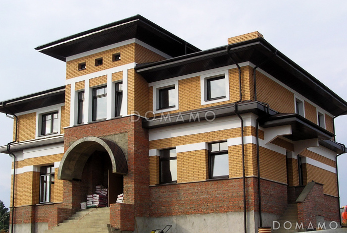 Проект двухэтажного коттеджа с террасой