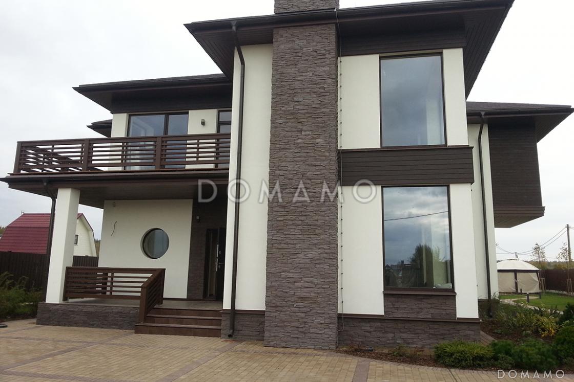 Проект двухэтажного дома из пеноблоков с большими окнами / 1