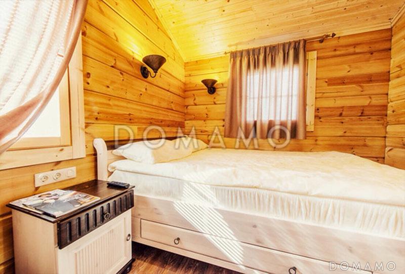 Проект небольшого одноэтажного деревянного дома из клееного бруса с двумя спальнями / 11