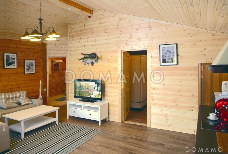 Проект небольшого одноэтажного деревянного дома из клееного бруса с двумя спальнями / 10