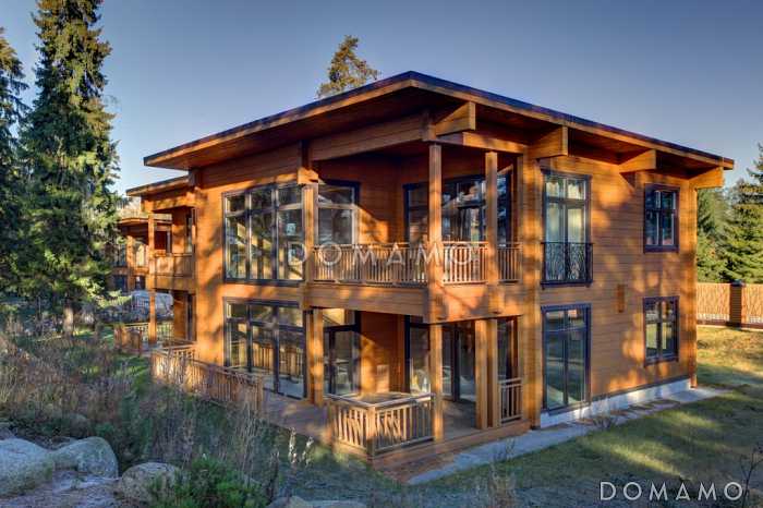 Проект двухэтажного дома из клееного бруса с кабинетом на первом этаже Проект двухэтажного дома из клееного бруса с кабинетом на первом этаже