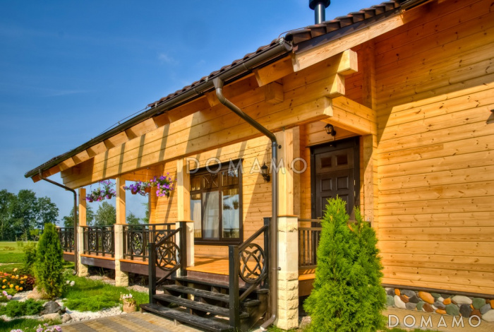 Проект двухэтажного дома из клееного бруса с бассейном и сауной на первом этаже Проект двухэтажного дома из клееного бруса с бассейном и сауной на первом этаже