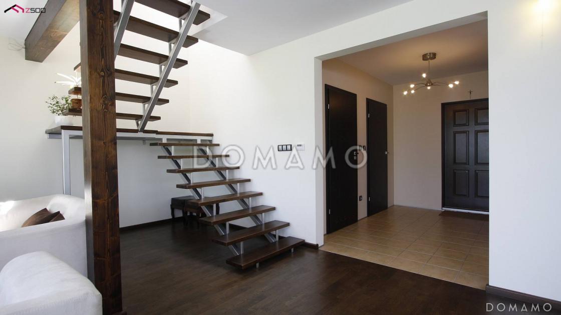 Проект одноэтажного дома из газобетона с мансардой и просторной гостиной / 12