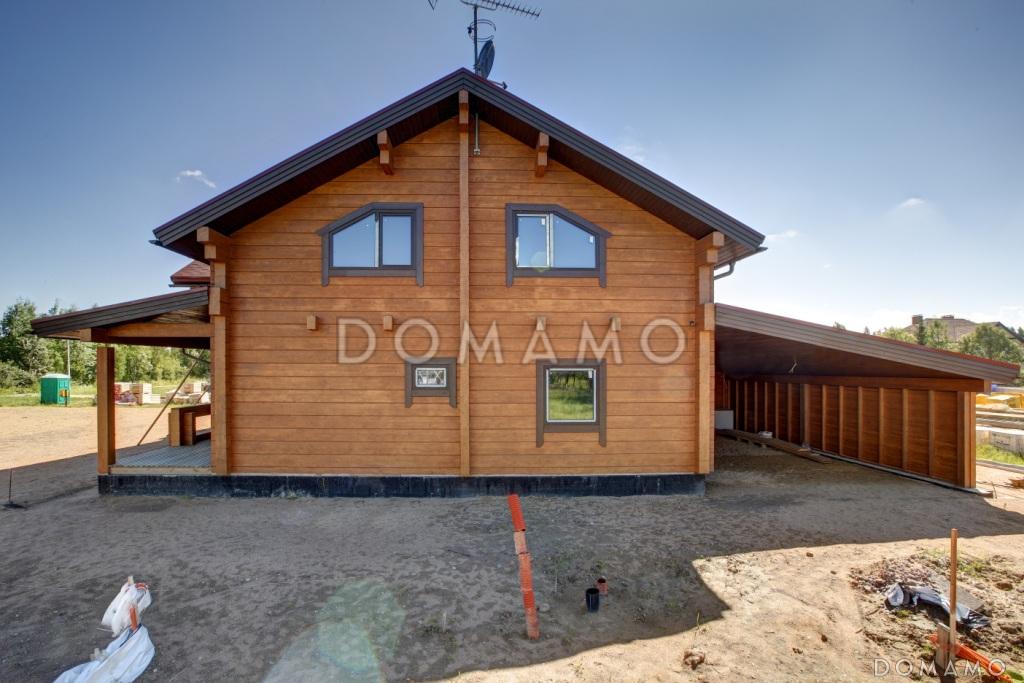 Проект деревянного дома из клееного бруса с большим эркером который является архитектурным украшением всего дома / 7