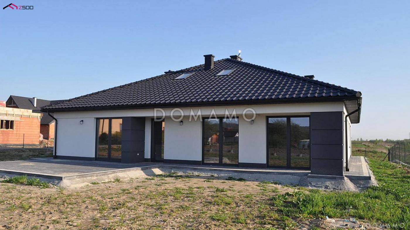 Проект квадратного одноэтажного дома из газобетона с четырьмя комнатами и гаражом для большой семьи / 22