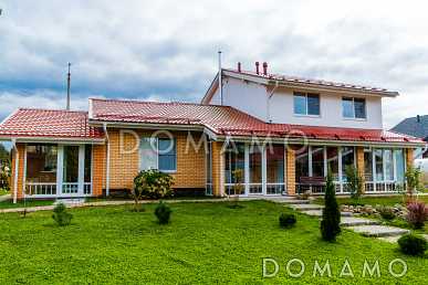 Проект кирпичного дома с небольшой мансардой