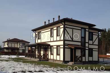 Проект двухэтажного дома из пеноблоков в стиле фахверк