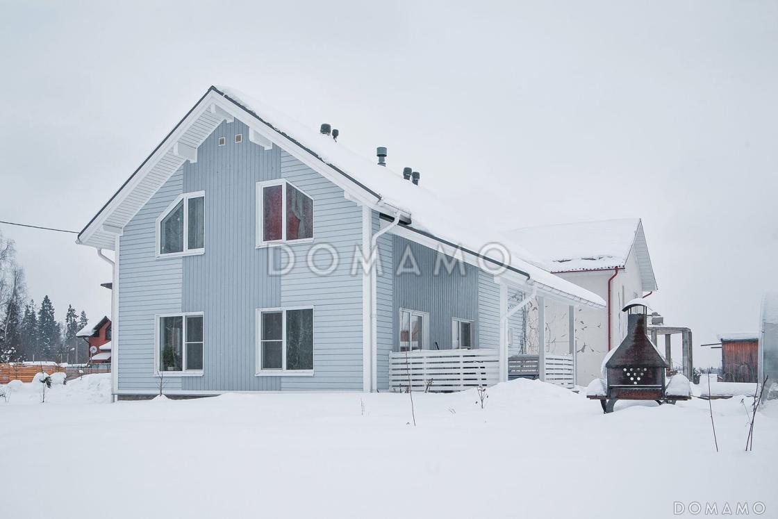 Проект кирпичного коттеджа в скандинавском стиле с 4 спальнями, светлой гостиной и террасой / 1