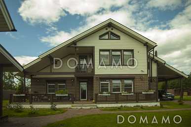 Проект кирпичного дома с отделкой из двух материалов