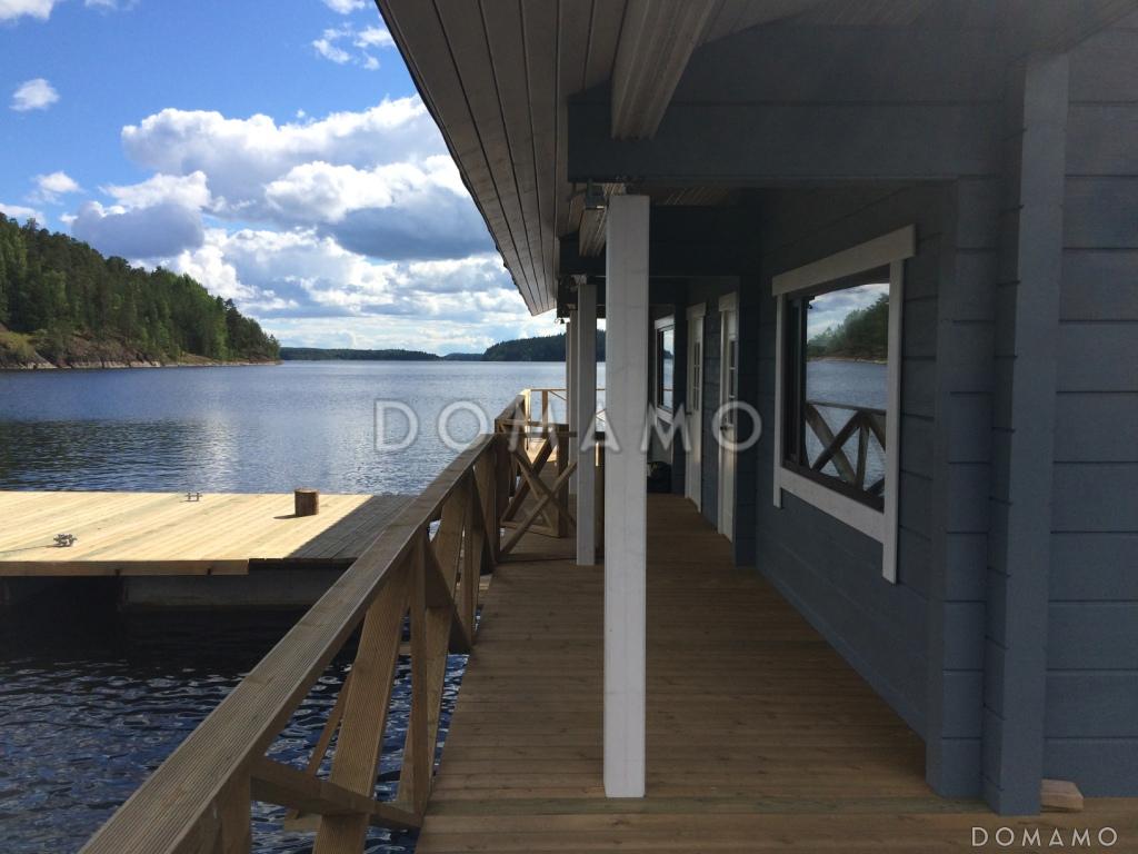 Проект деревянного дома из клееного бруса с крытой террасой расположенной по всему периметру дома / 13