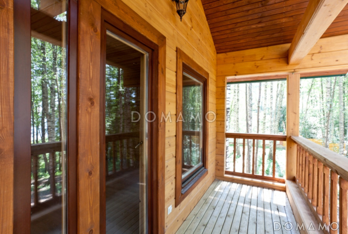 Проект респектабельного дома из клееного бруса с террасой Проект респектабельного дома из клееного бруса с террасой