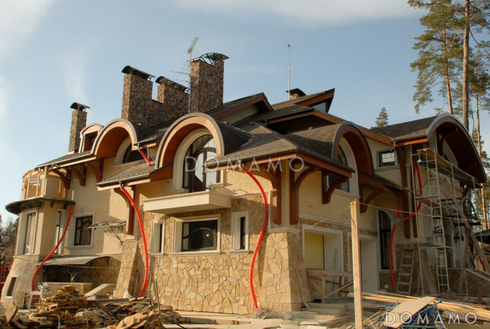 Проект коттеджа в стиле модерн с гаражом, зимним садом и сауной Проект коттеджа в стиле модерн с гаражом, зимним садом и сауной