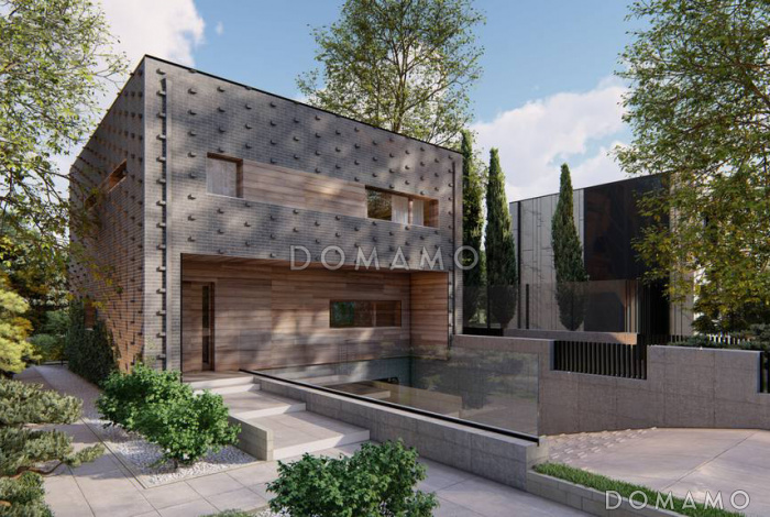 Проект дома с подземным гаражом на два автомобиля, кабинетом, светлой дневной зоной, спальнями на втором этаже