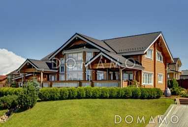 Проект дома из клееного бруса с обилием окон различной формы Проект дома из клееного бруса с обилием окон различной формы