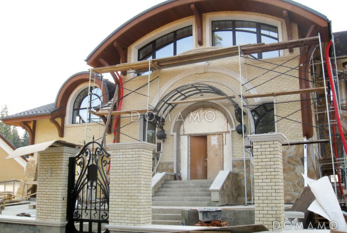 Проект коттеджа в стиле модерн с гаражом, зимним садом и сауной Проект коттеджа в стиле модерн с гаражом, зимним садом и сауной