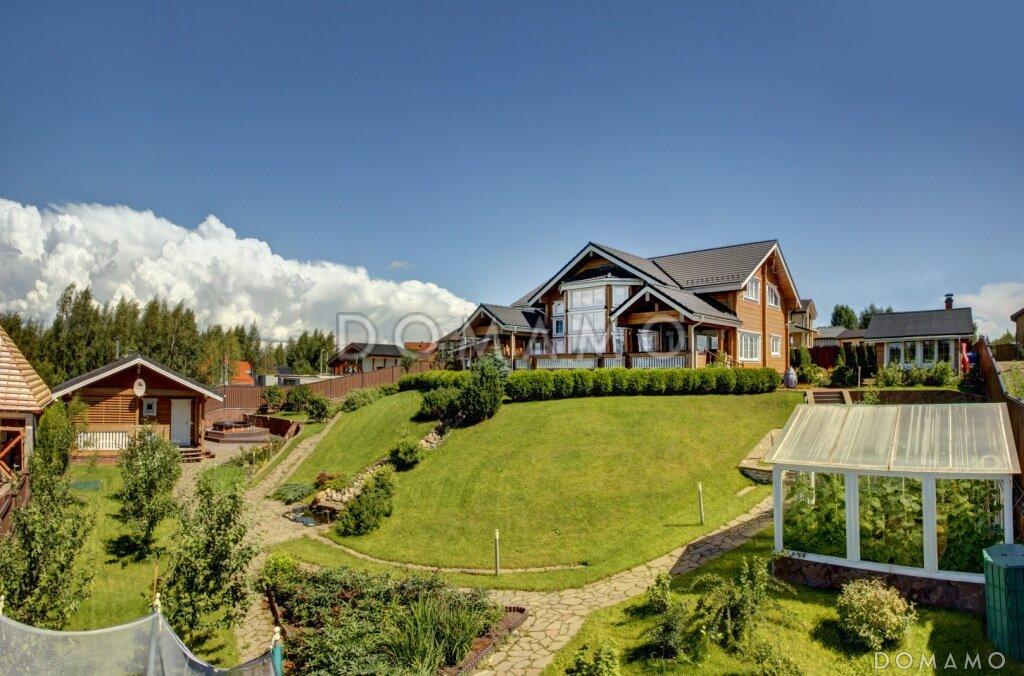 Проект дома из клееного бруса с обилием окон различной формы / 4