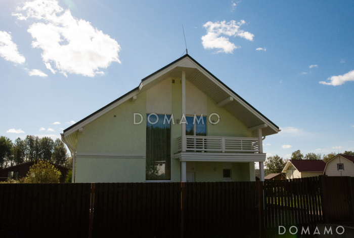 Проект дома из газобетона с угловой террасой