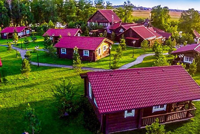 Проект небольшого одноэтажного деревянного дома из клееного бруса с двумя спальнями