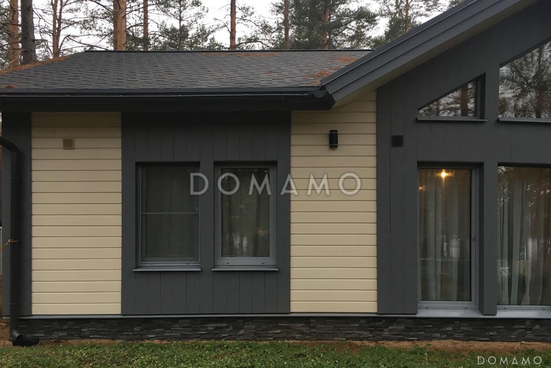 Проект скандинавского дома из кирпича с 2 спальнями, светлой гостиной и крытой террасой / 1