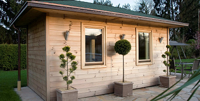 На каком расстоянии от забора можно строить баню