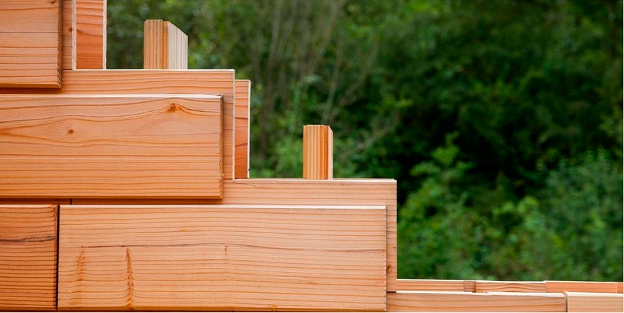 Утепление дома из бруса снаружи: выбор материалов, особенности технологии