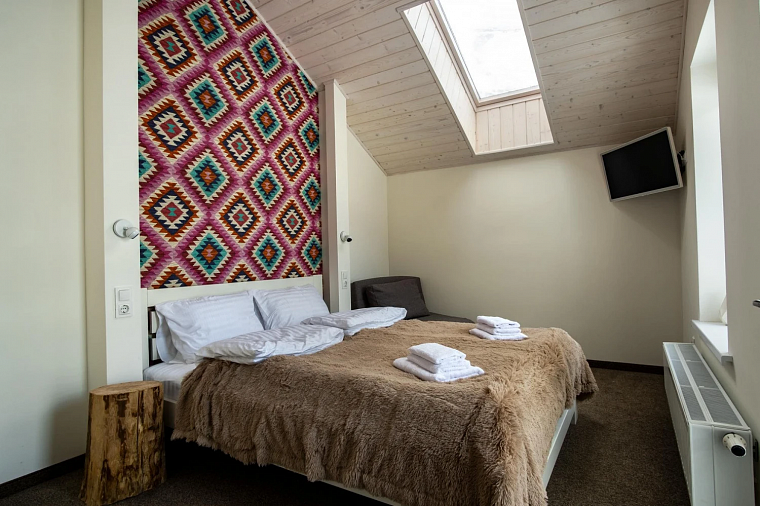 Дом с мансардой: за и против