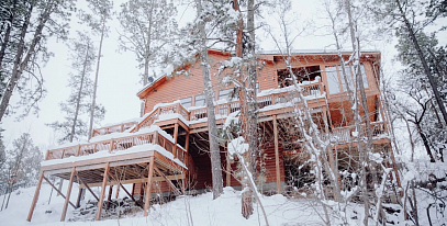 Утепление дома из бруса снаружи: выбор материалов, особенности технологии